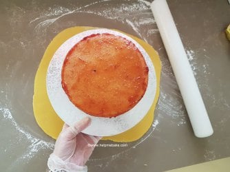 18 How to cover a cake by help me bake.jpg 18 How to cover a cake by help me bake.jpg
