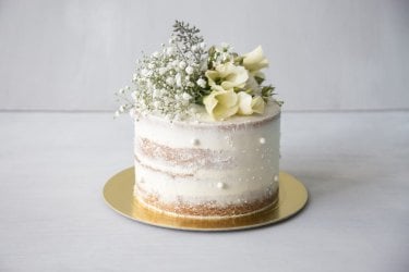 rustic naked cake with topper.jpg