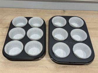 Lining cupcake trays by Help Me Bake.JPG Lining cupcake trays by Help Me Bake.JPG